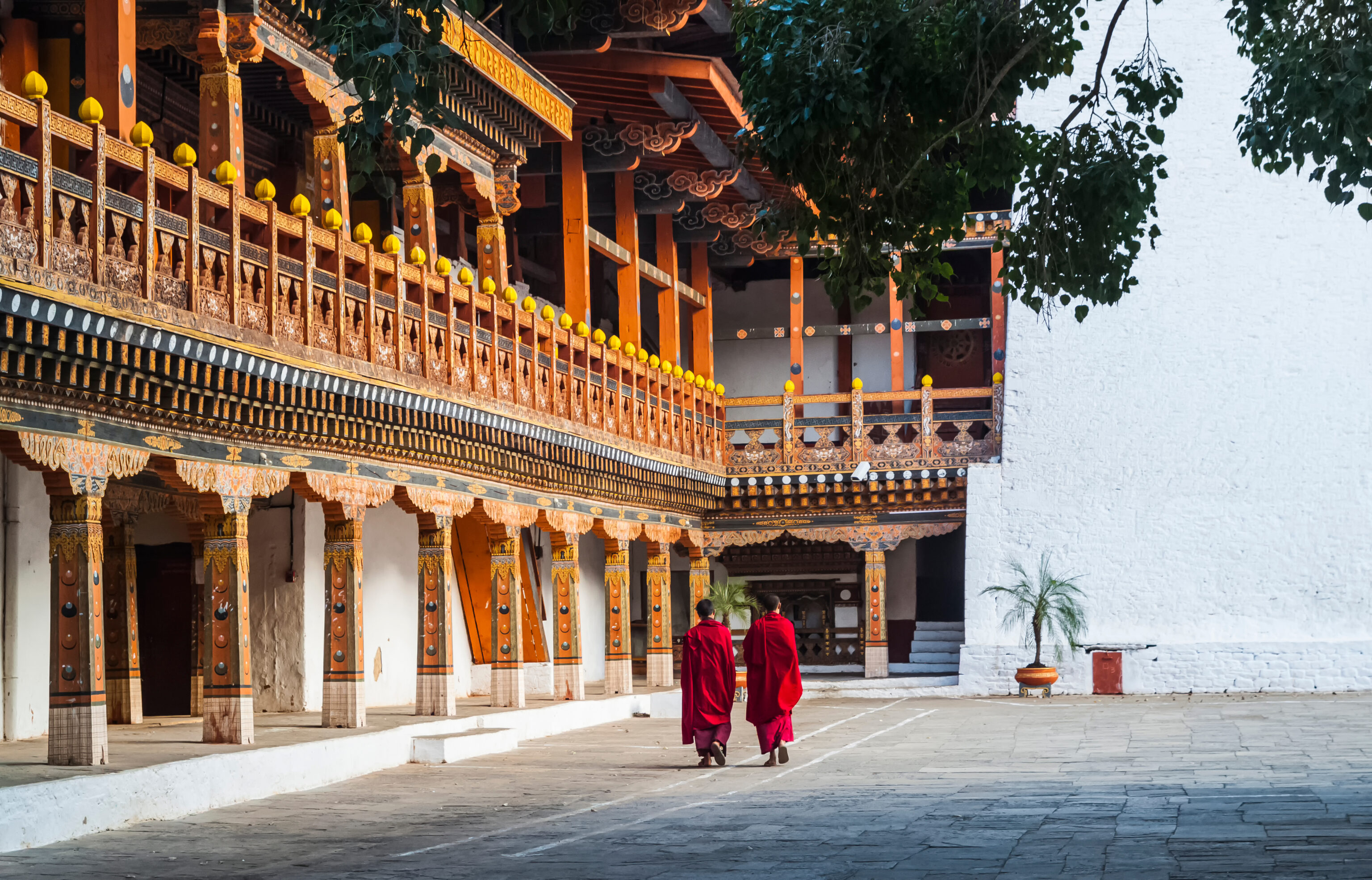 Two,Buddhist,Monks,At,Punakha,Dzong,,Bhutan