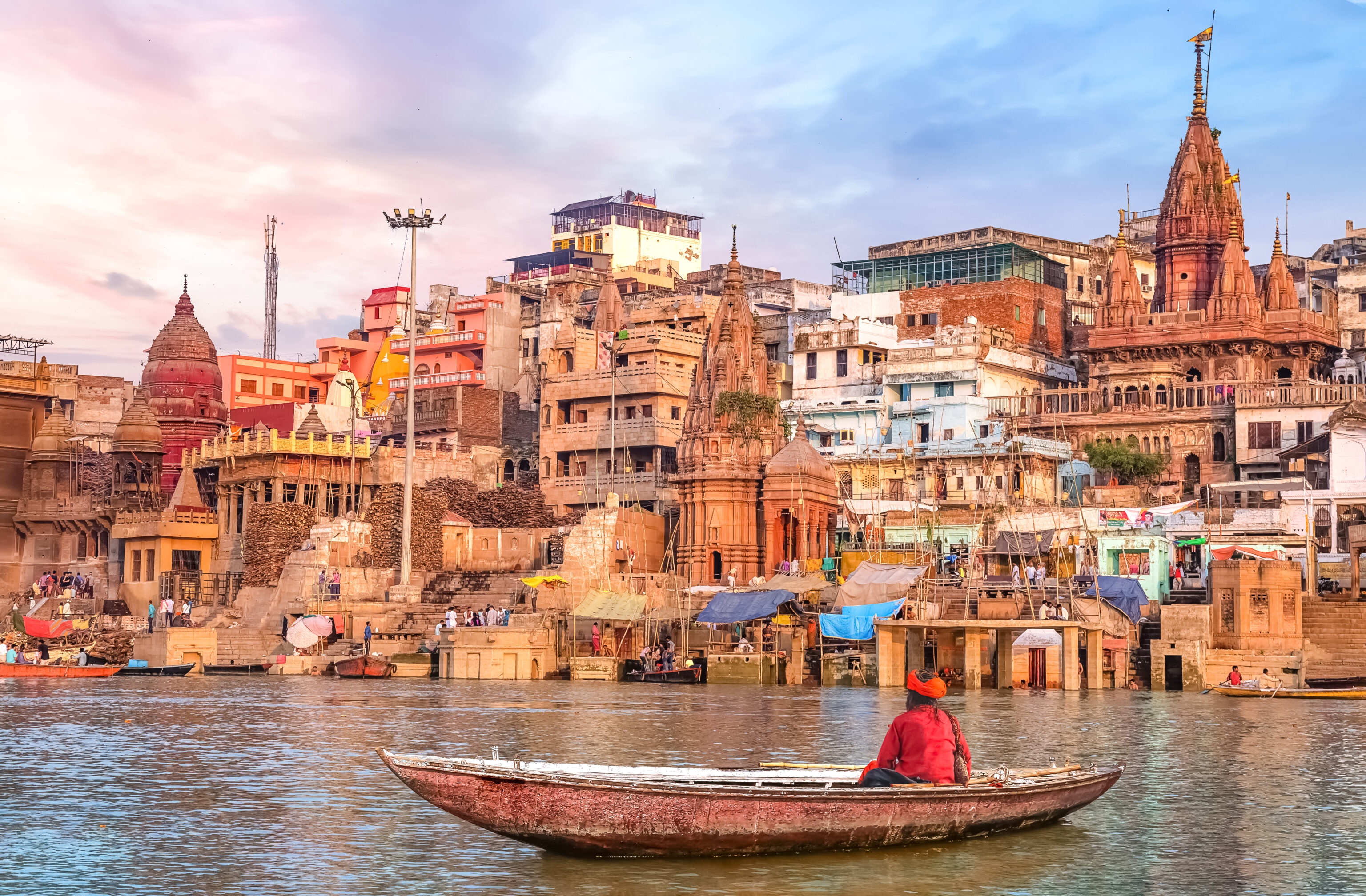 Ancient,Varanasi,City,Architecture,At,Sunset,With,View,Of,Sadhu